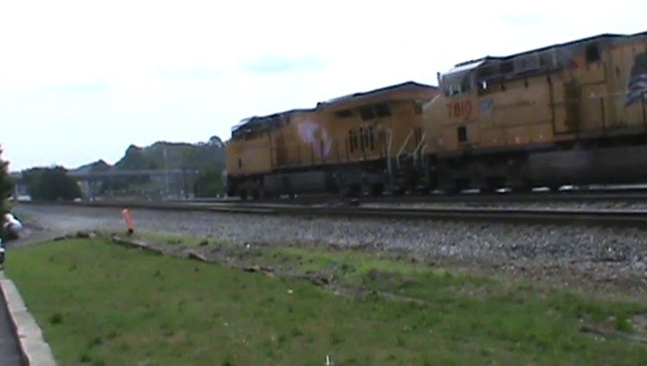 UP power leads NS 226 Intermodal train EB through Austell Ga.