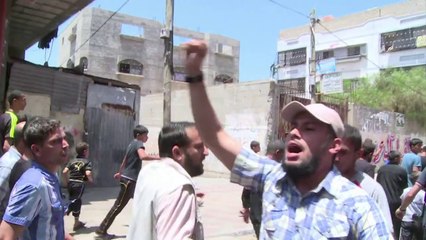 Palestinians bury man killed by an Israeli air strike