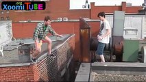 Wannabe parkour idiot almost kills himself on the rooftops