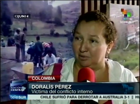 Abrazo entre hermano de Alfonso Cano y Santos sella apoyo electoral