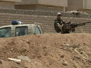 Irak: au checkpoint de Mossoul, tombé aux mains des islamistes - 15/06