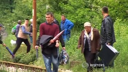 Bosnian flood victim: there's no road, no water, nothing is left"