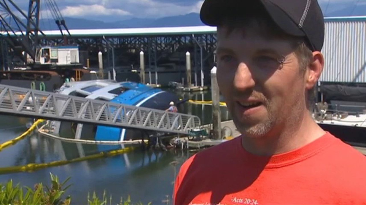 Six rescued after yacht flips on maiden launch