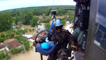 Baby rescued from flood waters in Bosnia