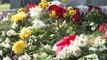 Woman charged with stealing flowers from graves