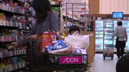 Tax hike gets Japan's consumers down - but not out