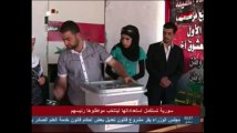 Raw: Polling stations open for Syrian elections
