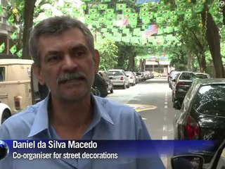 Rio residents decorate their streets for world cup