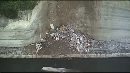 Raw: House teeters on edge of 75-foot cliff