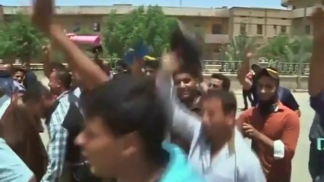 Iraq Kurds take Kirkuk as Sunni militants surge toward Baghdad