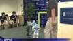 US students show off robots playing soccer