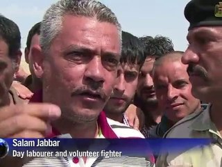 Iraqis volunteer to fight jihadists with government arms