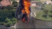 Raw: Fire crews burn house on Texas cliff
