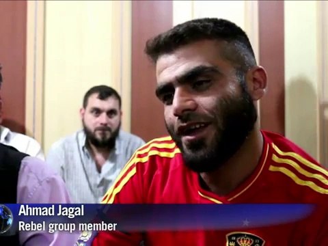 Syrian rebels watch the world cup in Aleppo
