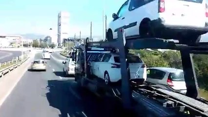 Van falls off a truck and... does not occur again!