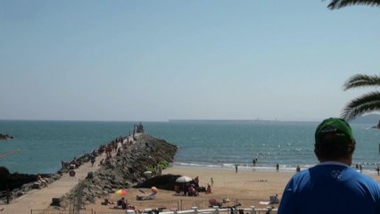 Playa Palmera y obras en el espigón puerto de Candás