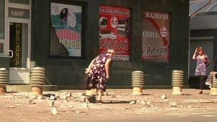 Slaviansk residents choose: live with hardship or leave