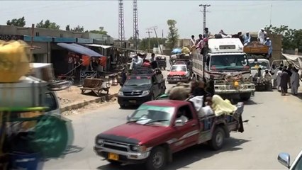 Tens of thousands flee Pakistan offensive against Taliban