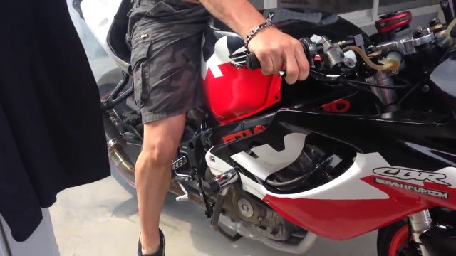 Motorcycle Stunt gone bad : biker crashes into swimming pool doing wheelie! Hilarious...