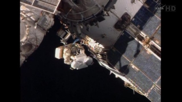 Cosmonauts install antenna at International Space Station