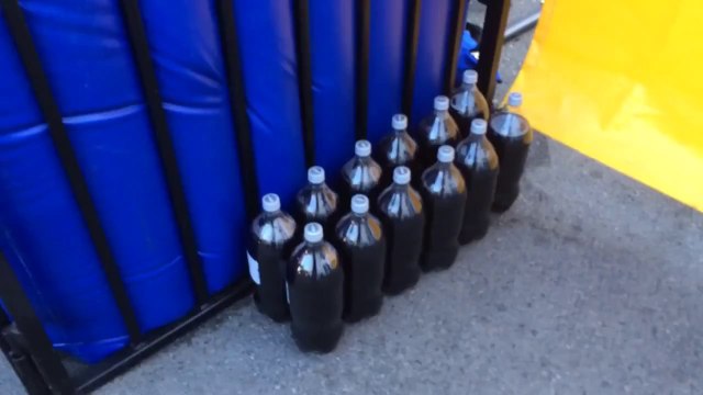 Guy wearing Mentos Suit and jumping in a Diet Coke Dunk Tank!!