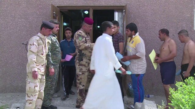 Thousands of Iraqis volunteer to fight Sunni militants