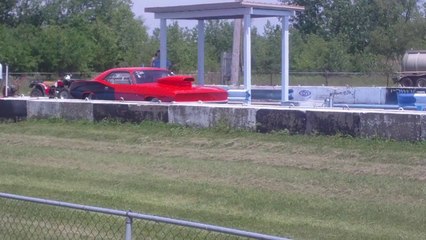 Old school Dodge Challenger Hole shot.