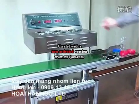 Máy dán màng seal bằng sóng cao tầng tự động, máy dán màng seal nắp chai dầu nhớt, chai thuốc bảo vệ thực vật