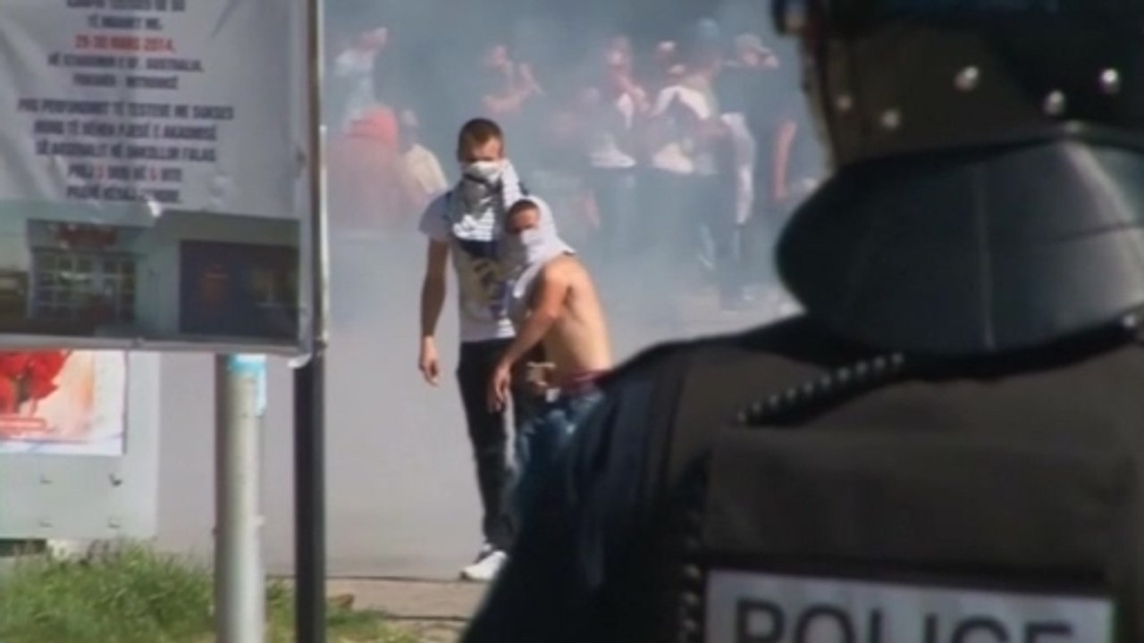 Police and protesters clash in Kosovo