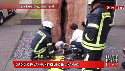 Girdiği dev vajina heykelinden çıkamadı