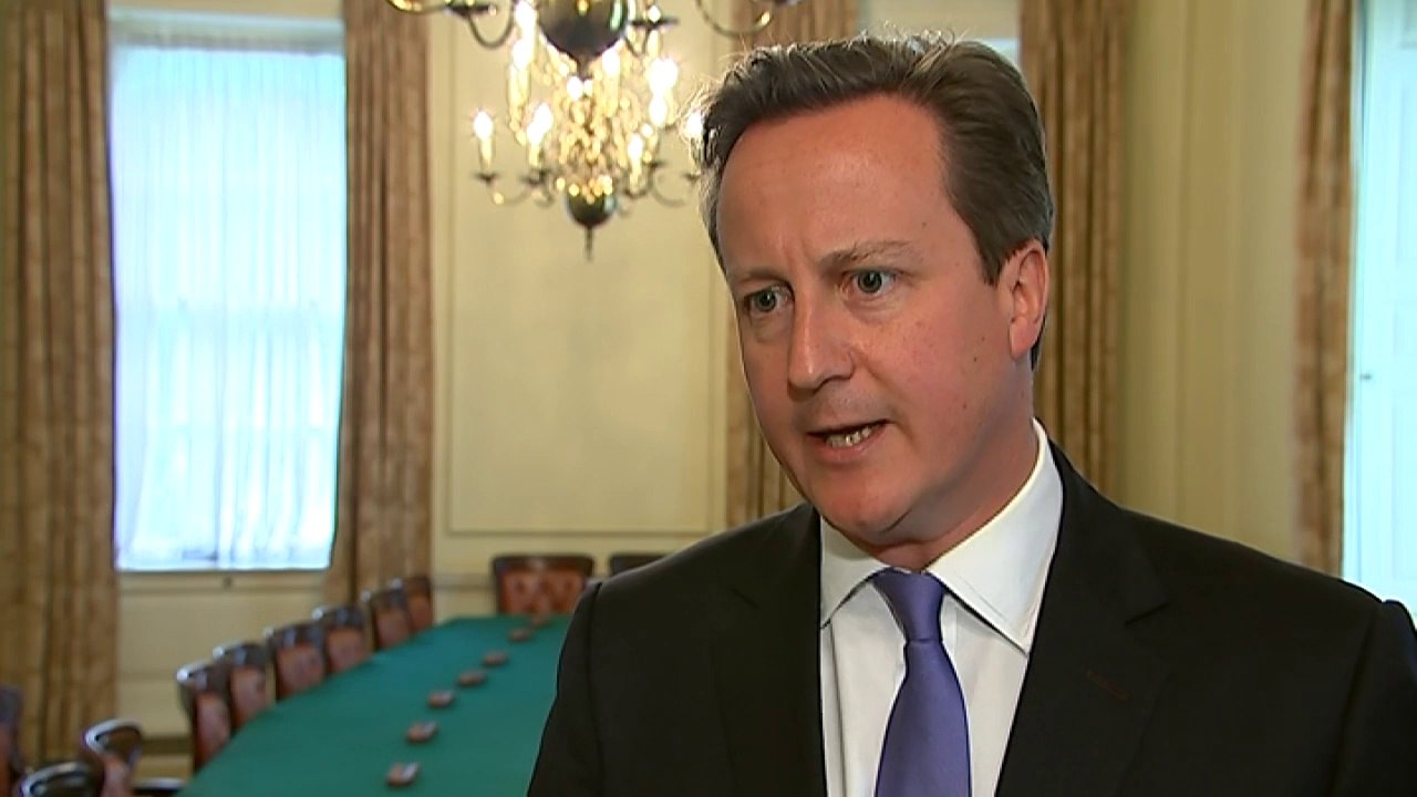 Cameron apologises for employing Andy Coulson