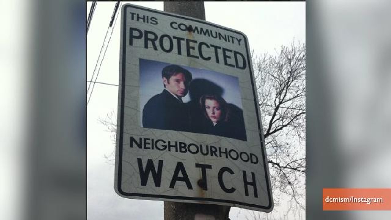 Toronto des panneaux de surveillance de quartier recouvert par des images de super héros