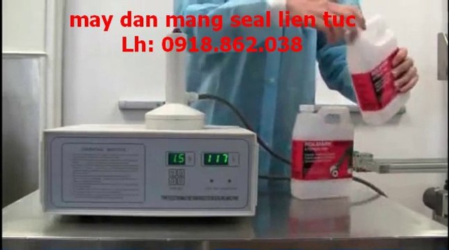 máy dán màng nhôm liên tục, máy màng seal chai hóa chất