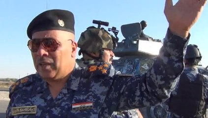 Avec une brigade de police à l'ouest de Bagdad