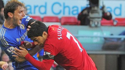 FIFA bans Suarez for nine games and four months