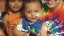 Toddler injured by flash grenade all smiles in recovery