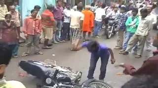 Girl beats boy in front of public in INDIA