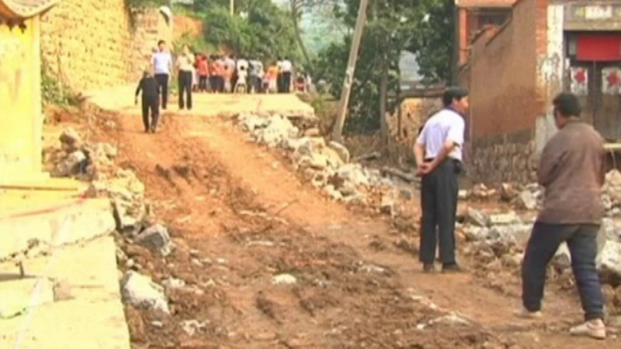 Canal collapse in central China floods farms and villages