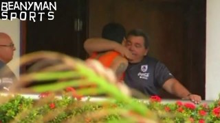 Disgraced Luis Suarez Shares Emotional Embrace As He Leaves Uruguay Hotel