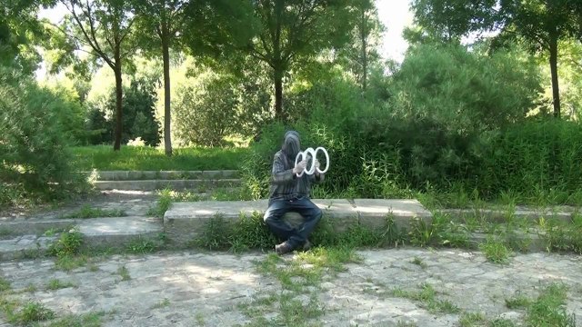 Blindfolded Performing Artist Will Blow Your Mind With Hoop Illusion