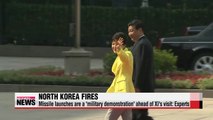 North Korea fires missiles in show of strength on eve of South Korea-China talks (2)
