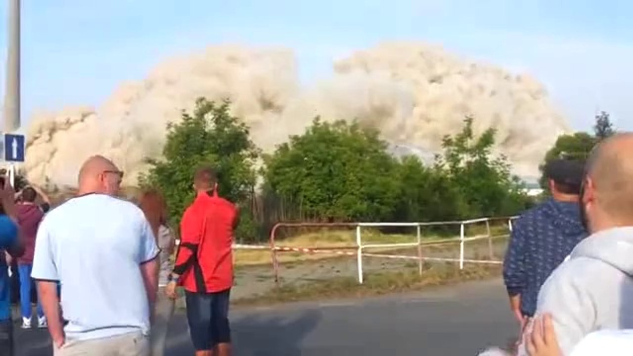 Guy Gets Almost Killed By Rock Flying From Demolition - Damn Lucky!