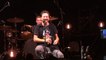 Pearl Jam singer Eddie Vedder drinking wine from a fan shoe in stockholm festival