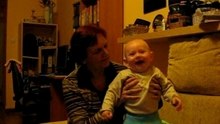laughing 7 months with grandmother