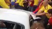 Colombian soccer Supporters destroying a BMW Z4