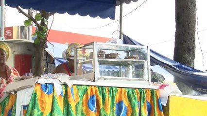 Brasil 2014 - Vendedores ambulantes de comida ganan su pulso a la FIFA