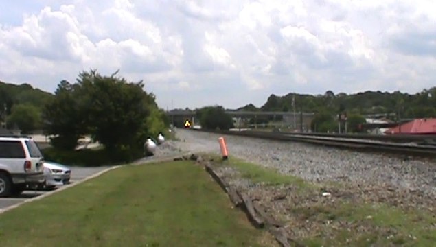 BNSF power leads NS 735 Coal train NB through Austell Ga.