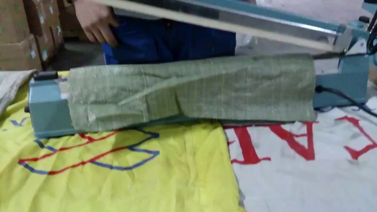 Máy miệng túi nilong dập tay, máy hàn mép túi nilong dập tay, LH 0909134877