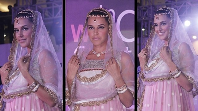 Neha Dhupia Walks The Ramp At Indian Wedding Couture Show