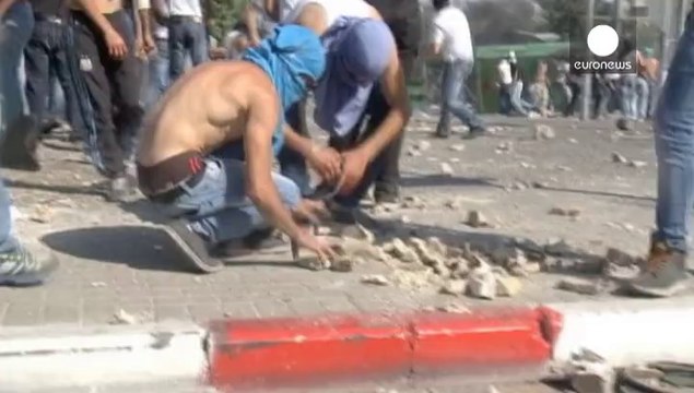 Palestinians react angrily to a strong Israeli police presence in East Jerusalem